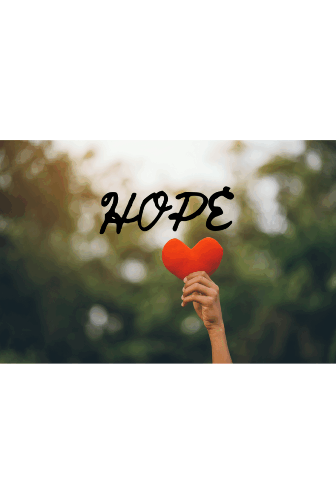 Close-up of gentle hands holding a heart-shaped object, representing self-love, healing, and hope for future relationships.